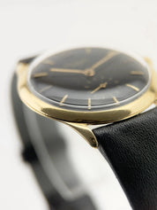 Patek Philippe Calatrava 18k Yellow Gold Black Dial 33mm Manual Wind Watch 2557