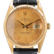 Rolex Oyster Perpetual Date 34 Fluted Bezel 18K Gold Champagne Dial Watch