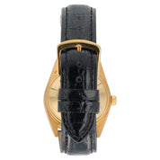 Rolex Oyster Perpetual Date 34 Fluted Bezel 18K Gold Champagne Dial Watch