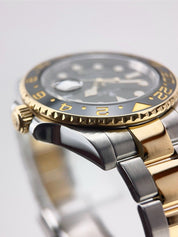 Rolex GMT-Master II Steel & Gold Black Dial 40mm Automatic Men’s Watch 116713