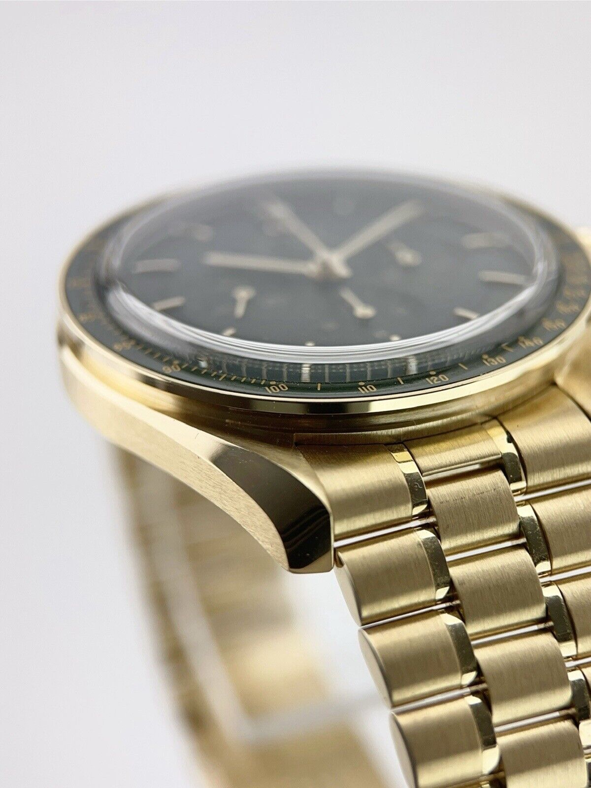 Omega Speedmaster Moonwatch 18k Gold Green Dial 42mm Manual 310.60.42.50.10.001