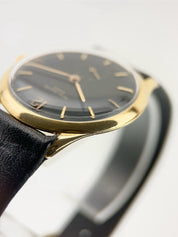 Patek Philippe Calatrava 18k Yellow Gold Black Dial 33mm Manual Wind Watch 2557