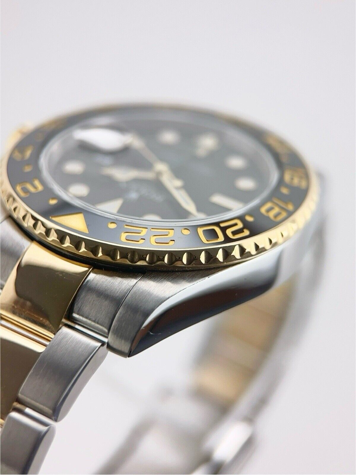 Rolex GMT-Master II Steel & Gold Black Dial 40mm Automatic Men’s Watch 116713