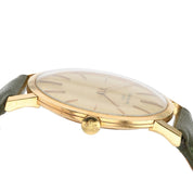 Patek Philippe Calatrava 18k Gold Champagne Linen Dial 33mm Manual Wind 2573