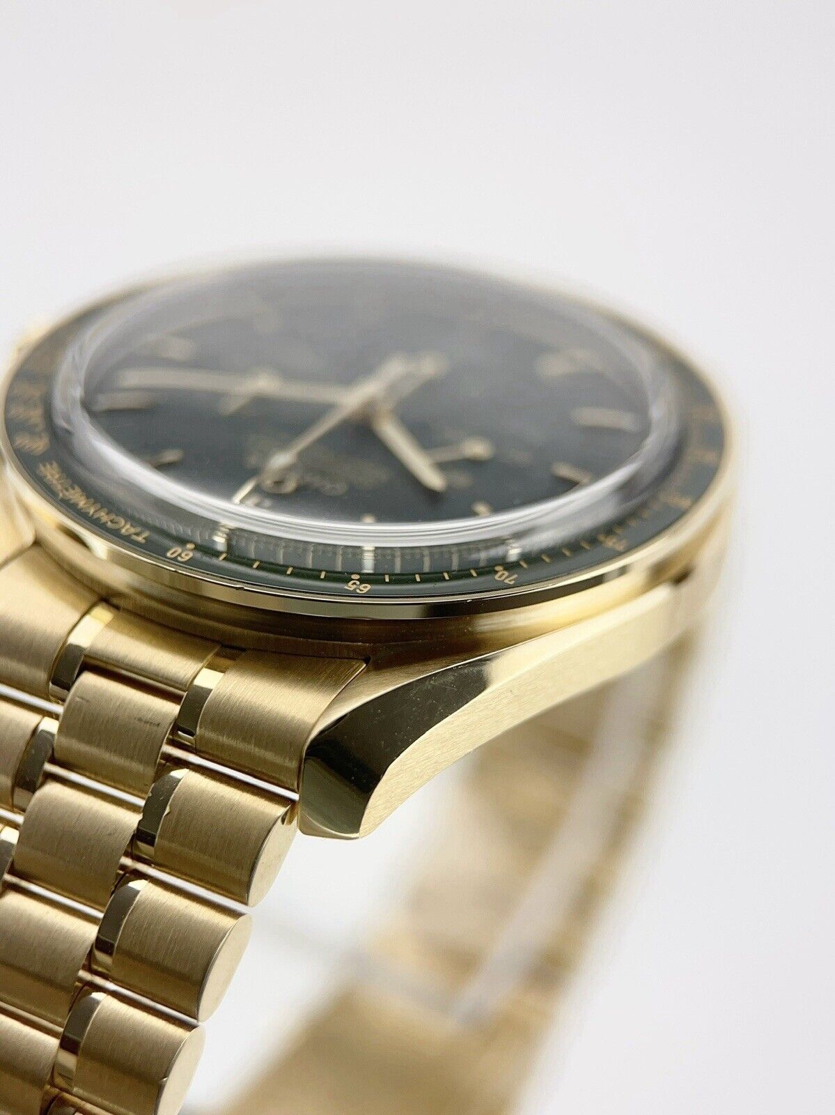 Omega Speedmaster Moonwatch 18k Gold Green Dial 42mm Manual 310.60.42.50.10.001