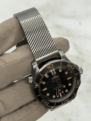 2025 Omega Seamaster NTTD Titanium Brown Dial 42mm Watch 210.90.42.20.01.001