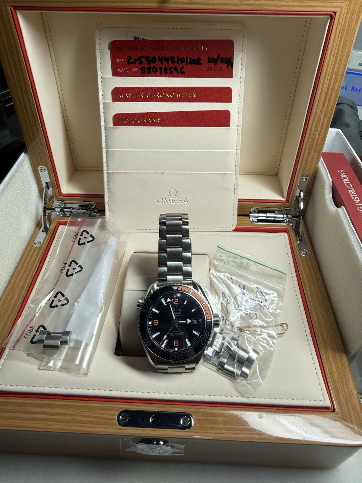 Omega Seamaster Planet Ocean Black/Orange Ceramic Watch 215.30.44.21.01.002